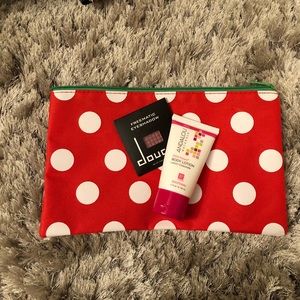 Makeup bag with lotion and eyeshadow
